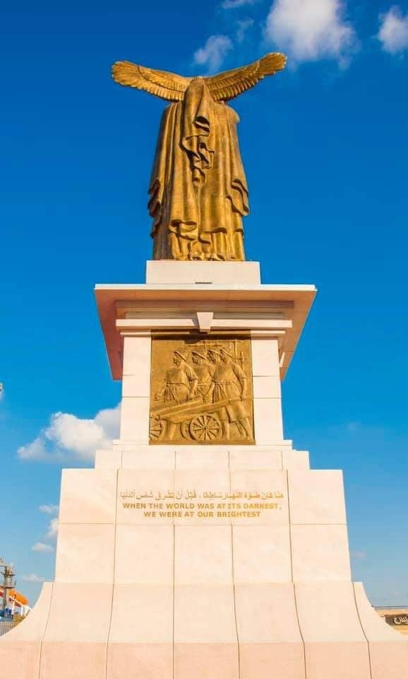 Rear view of the bronze statue of Om El Donia in Port Said